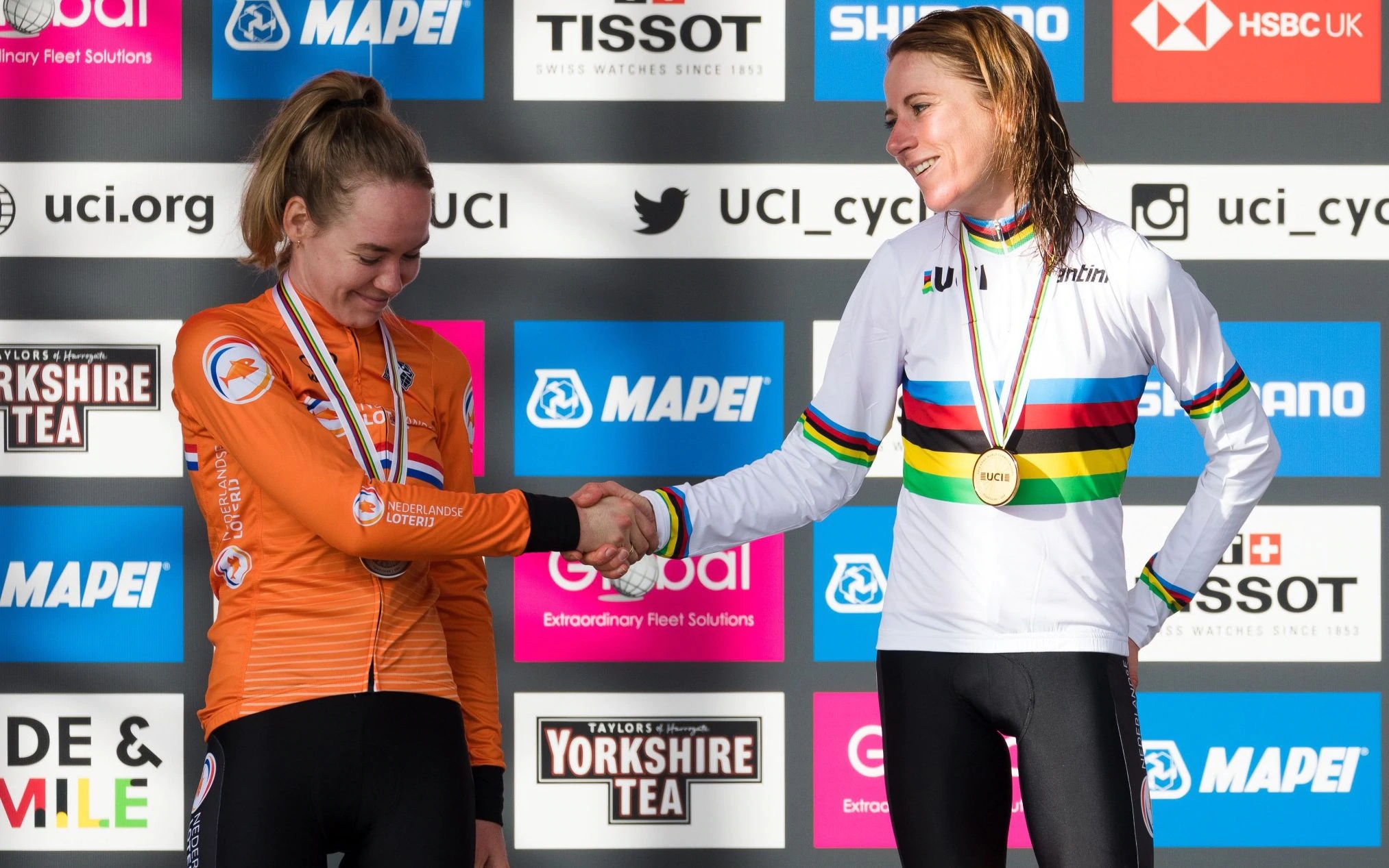 Annemiek van Vleuten, of the Netherlands, takes the rainbow jersey after winning the elite women’s road race at the 2020 UCI Road World Championships in Yorkshire